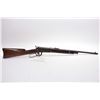 Image 1 : Winchester Model 1894 .25 - 35 WCF Cal Lever Action Saddle Ring Carbine w/ 20" bbl half mag [ fading