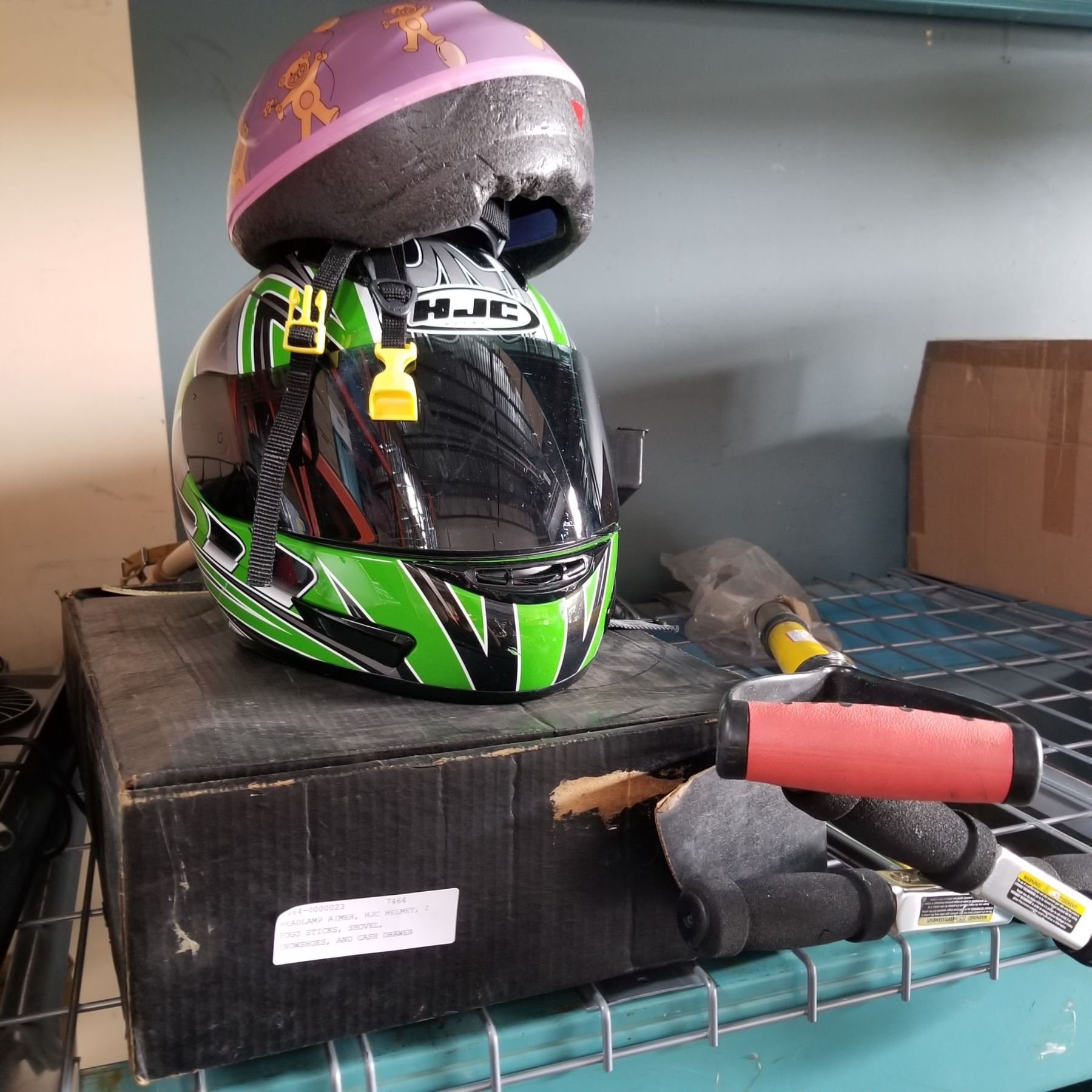 HEADLAMP AIMER, HJC HELMET, 2 POGO STICKS, SHOVEL, SNOWSHOES, AND CASH DRAWER Big Valley Auction