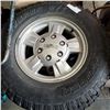 Image 2 : SET OF 3 TRACTION KING 235/75 R15 TIRES ON GMC 6 BOLT RIMS