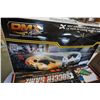 Image 2 : DMX RACER SLOT CAR SET, 3 HELMETS, AND MINI FOOSBALL GAME
