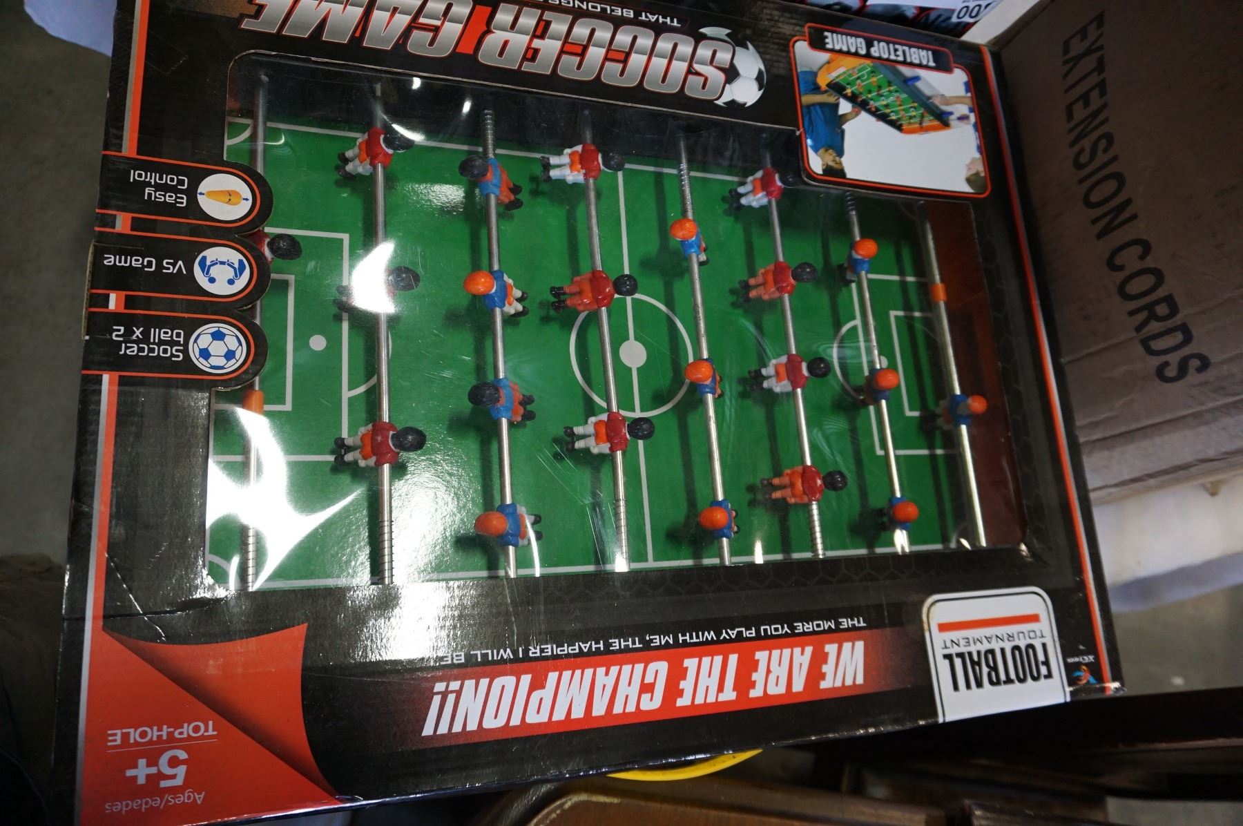 DMX RACER SLOT CAR SET, 3 HELMETS, AND MINI FOOSBALL GAME