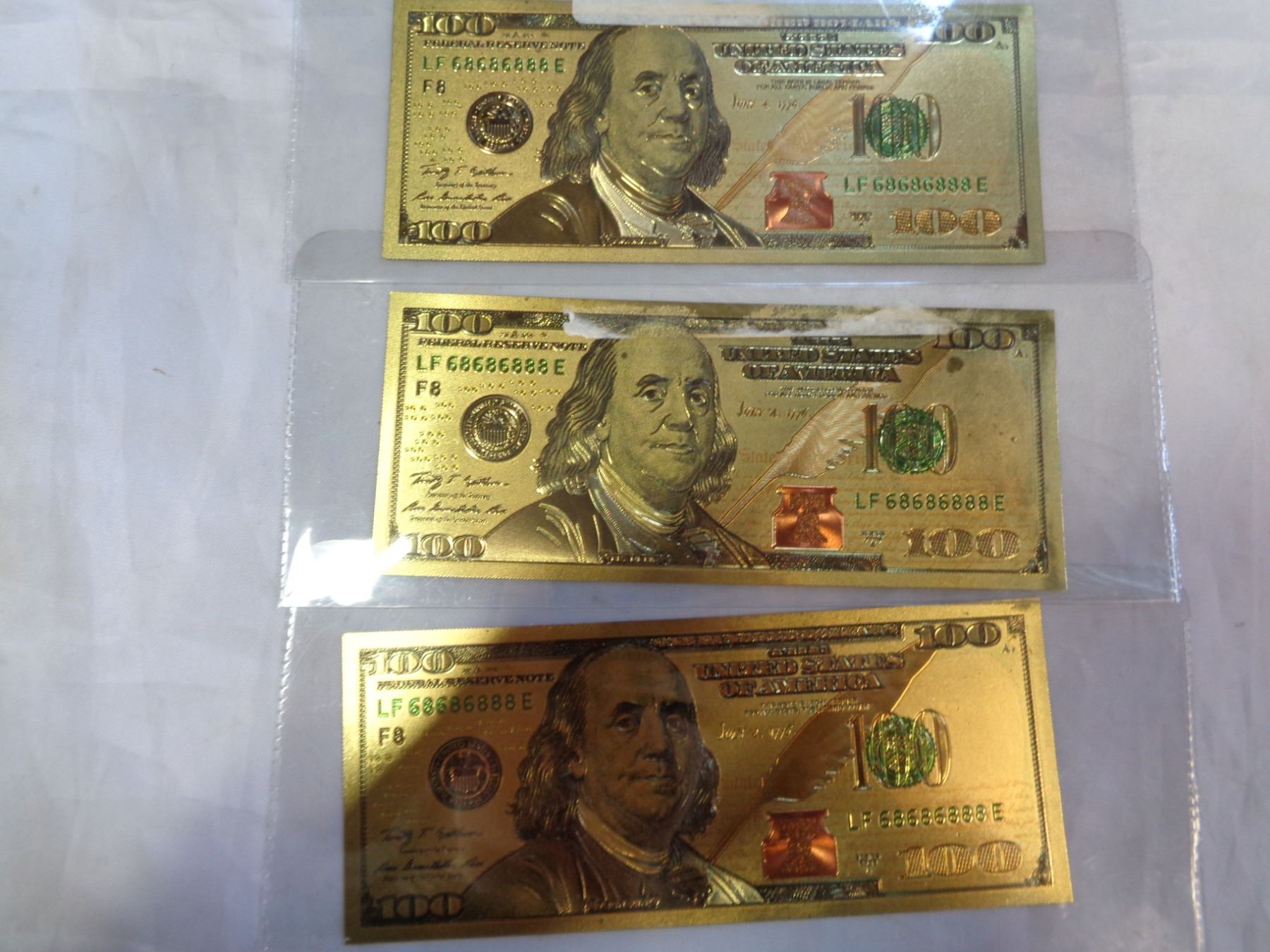 thumbnail image 2 of 3pk 7 Arcángel Dorados Gold Foil Bills - 7 Archangel Golden Bills (Mexico) 2 of 5