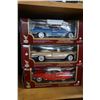 Image 1 : 2 CADILAC AND CHEVROLET 1950s BOXED DIE CAST 1:18 SCALE CARS