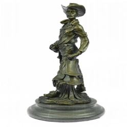 Old Cowboy holding his Saddle Bronze Sculpture