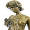 Image 7 : Young lady Gazes into a Flower Bronze Sculpture