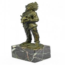 Indian with Feathered Headdress Holding an Ox Head Bronze Sculpture