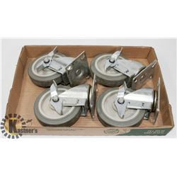 SET OF 4 LARGE LOCKING CASTOR WHEELS.