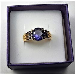 8)  ROUND AMETHYST RING SET IN YELLOW