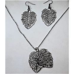 19)  SILVER TONE FILAGREE LEAF PENDANT ON