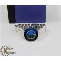 BLUE FACED SWAROVSKI LADIES WATCH WATER RESISTANT.