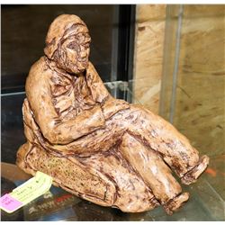 VINTAGE CHALKWARE SCULPTURE OF MAN RESTING ON