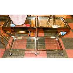 BOUTIQUE PAIR OF CHROME END TABLES ON WHEELS