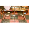 Image 1 : BOUTIQUE PAIR OF CHROME END TABLES ON WHEELS