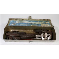 SMALL TOOL BOX WITH 3 VINTAGE PIPE WRENCHES.