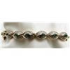 Image 1 : 7" BRACELET WITH GREEN GEMS AND
