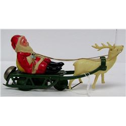 VINTAGE CELLULOID WIND UP SANTA TIN & PLASTIC TOY