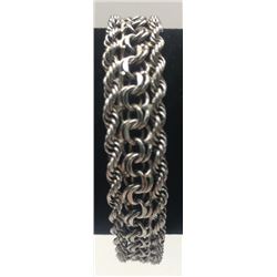 7 INCH STERLING BRACELET WITH A UNIQUE