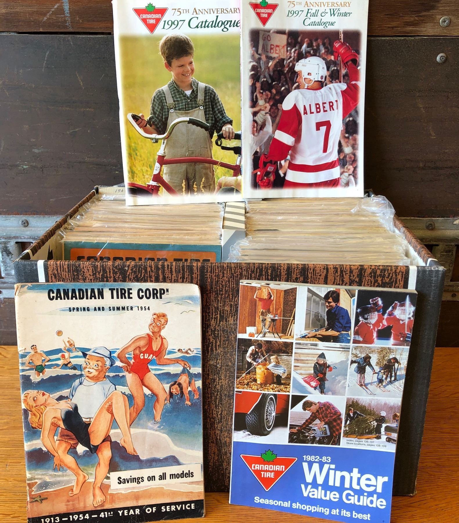 SET OF CANADIAN TIRE CATALOGS, 1950'S TO 1980'S