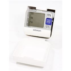 OMRON WRIST BLOOD PRESSURE & HEART MONITOR.