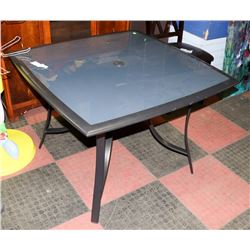 NEW METAL AND GLASS PATIO TABLE. FURNITURE