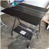Image 1 : CLOTHES FOLDING ROLLING TABLE