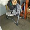 Image 2 : INFANTINO BABY CARRIER, BABY SWING, AND STUFFED GIRAFFE
