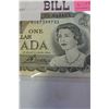 Image 2 : 1973 CANADIAN 1 DOLLAR BANKNOTE UNCIRCULATED - LAST YEAR OF ISSUE