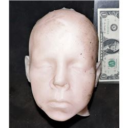SOLID SILICONE HEAD TORN OFF AT NECK
