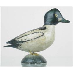 IMPORTANT early pair of miniature goldeneye by A.