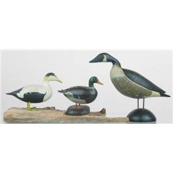 Lot of three miniature carvings. A Canada goose s