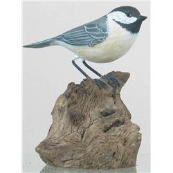 Lifesize chickadee carving ca 1980s on a burl mou