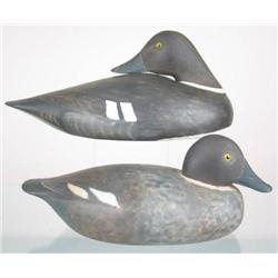 Lot of two solid body golden eye hen decoys by Al