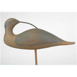 Preening curlew carving by Alberto Williams with 