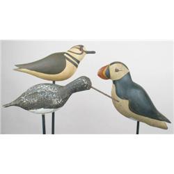 Lot of three bird carvings. A piping plover brand