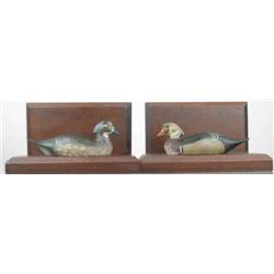 Pair of miniature wood ducks mounted on book ends