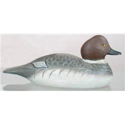 Content posture golden eye hen decoy made by the 