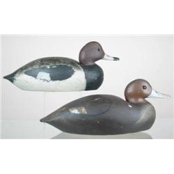 Pair of solid body, glass eye, redhead decoys by 