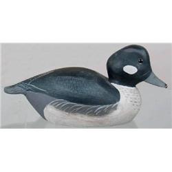 Bufflehead hen decoy with a turned head and glass