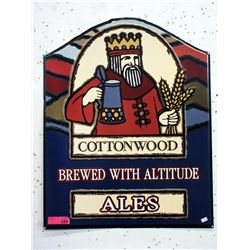 Embossed Metal "Cottonwood Ales" Sign