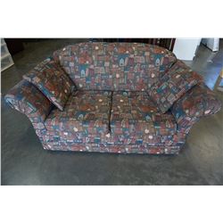 UPHOLSTERED LOVE SEAT W/ BOOKSHELF PATTERN FABRIC