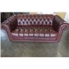 Image 1 : LEATHER BUTTON TUFTED LOVESEAT WITH STUDDED ACCENT