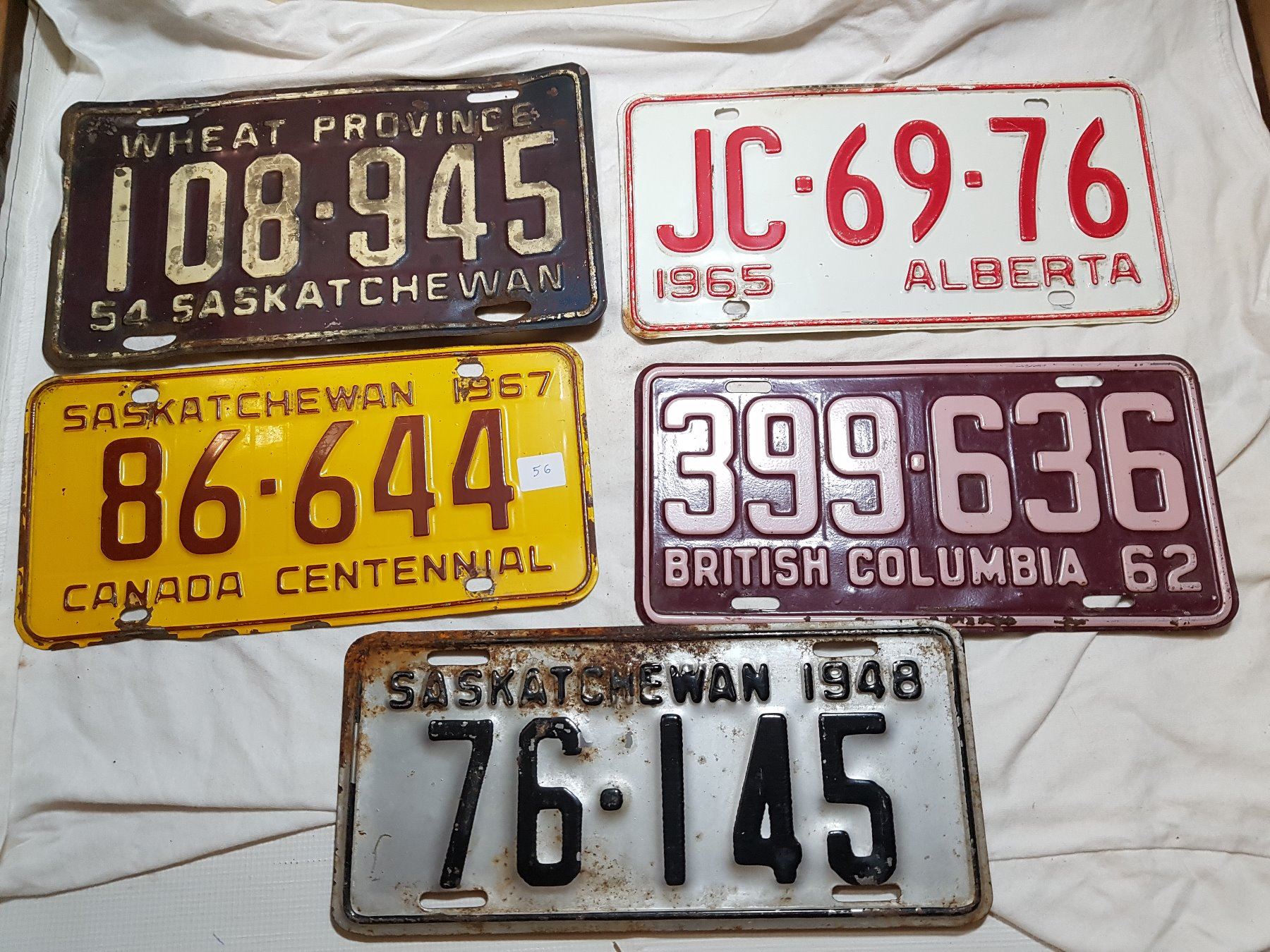 LOT OF ASSORTED LICENSE PLATES (BC, ALTA, SASK)