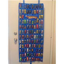 OVER 100 MATCHBOX CARS ON DOOR MOUNT RACK WITH SLEEVES