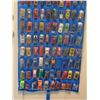 Image 3 : OVER 100 MATCHBOX CARS ON DOOR MOUNT RACK WITH SLEEVES