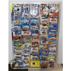LARGE DISPLAY OF HOT WHEELS SEALED CARS 48