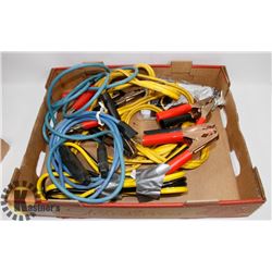 FLAT WITH JUMPER CABLES AND EXTENSION CORDS