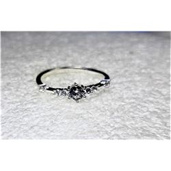 6)  SILVER TONE AND WHITE TOPAZ FINE