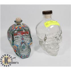 SET OF 2 COLLECTIBLE SKULL BOTTLES.