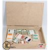 Image 1 : CIGAR BOX WITH 10X100 BUNDLED & CATALOGUED STAMPS.