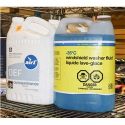 2 BOTTLES OF DEF FLUID WITH WINDSHEILD WASHER